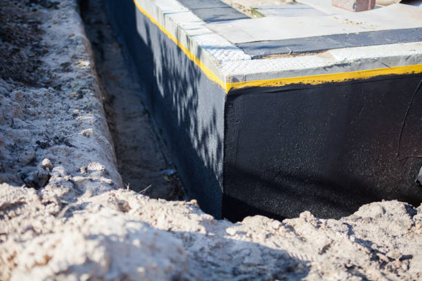Professional Waterproofing technician working in Elberta, AL
